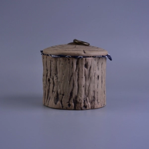 Bougeoir en céramique marron en forme d'arbre avec couvercle