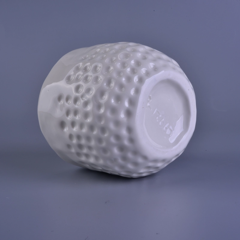 white ceramic candle holder