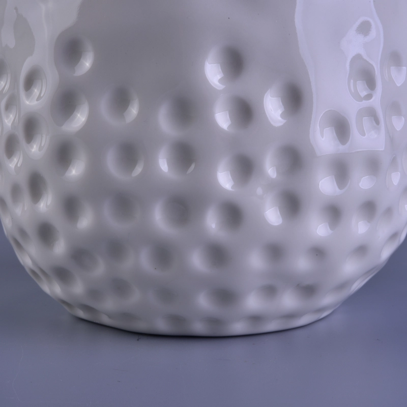 white ceramic candle holder