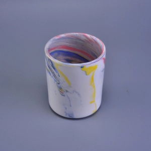 Ceramic candle holder with colorful pattern