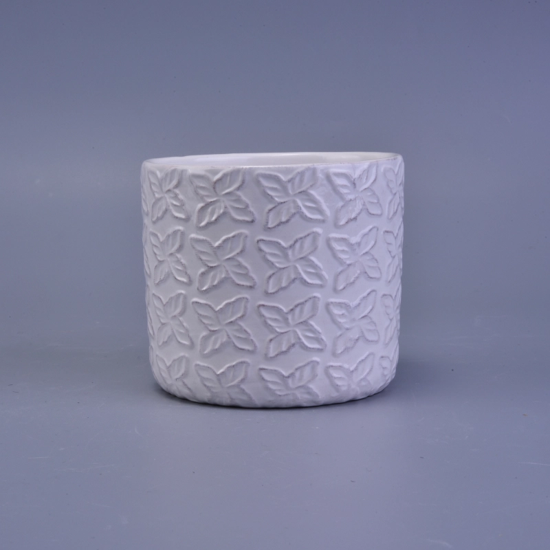 matte white ceramic candle holder with embossed pattern
matte white ceramic candle holder with embossed pattern