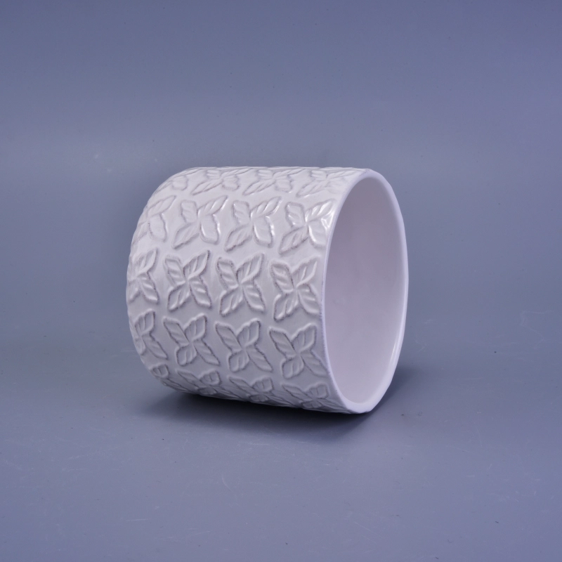 matte white ceramic candle holder with embossed pattern
matte white ceramic candle holder with embossed pattern