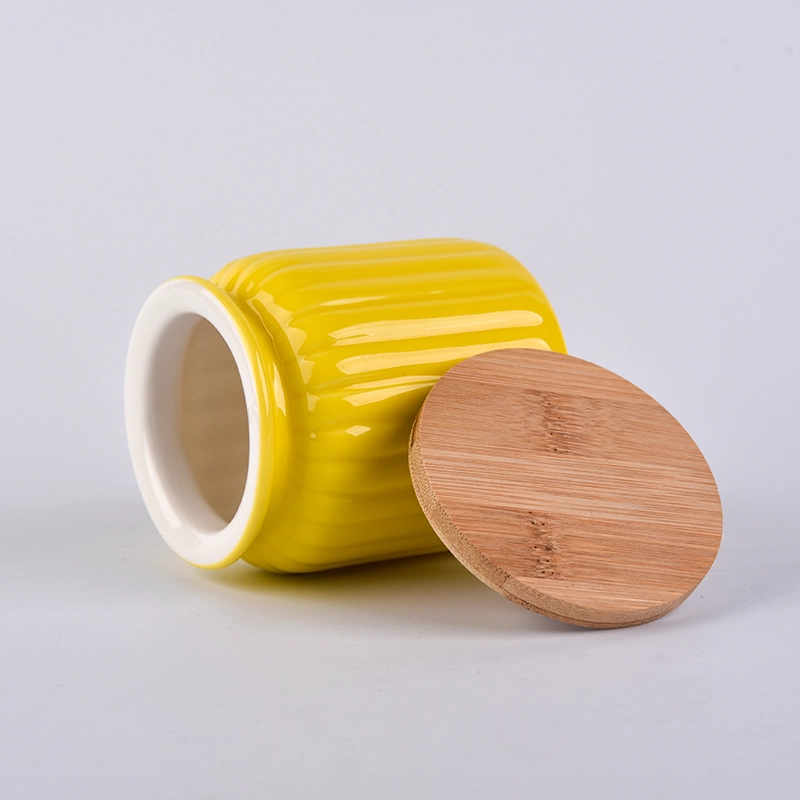 Yellow pumpkin ceramic container with wood lid Yellow pumpkin ceramic container with wood lid