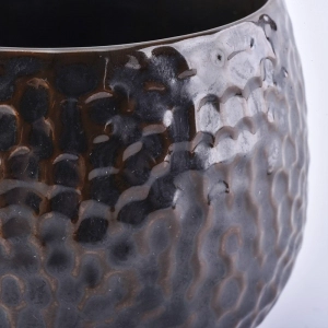Manufacturer embossed Amber ceramic candle holder
