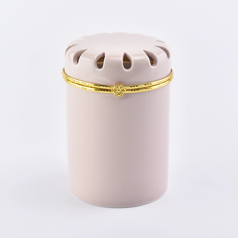 Ceramic candle jar with decorative lid Ceramic candle jar with decorative lid