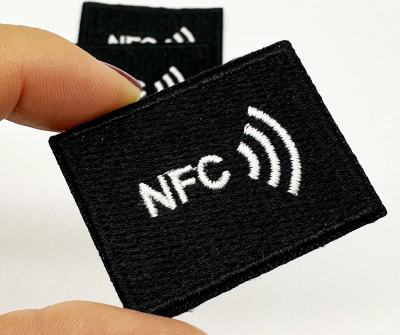 China Iron on Patches Sticker NTAG213 nfc tag woven label hot press washing tag for garment manufacturer
