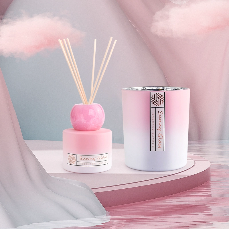Elegant gradual change pink glass reed diffuser bottle and glass candle holder Elegant gradual change pink glass reed diffuser bottle and glass candle holder