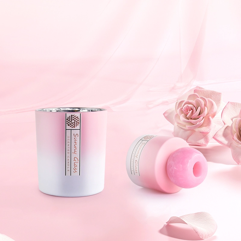 Elegant gradual change pink glass reed diffuser bottle and glass candle holder Elegant gradual change pink glass reed diffuser bottle and glass candle holder