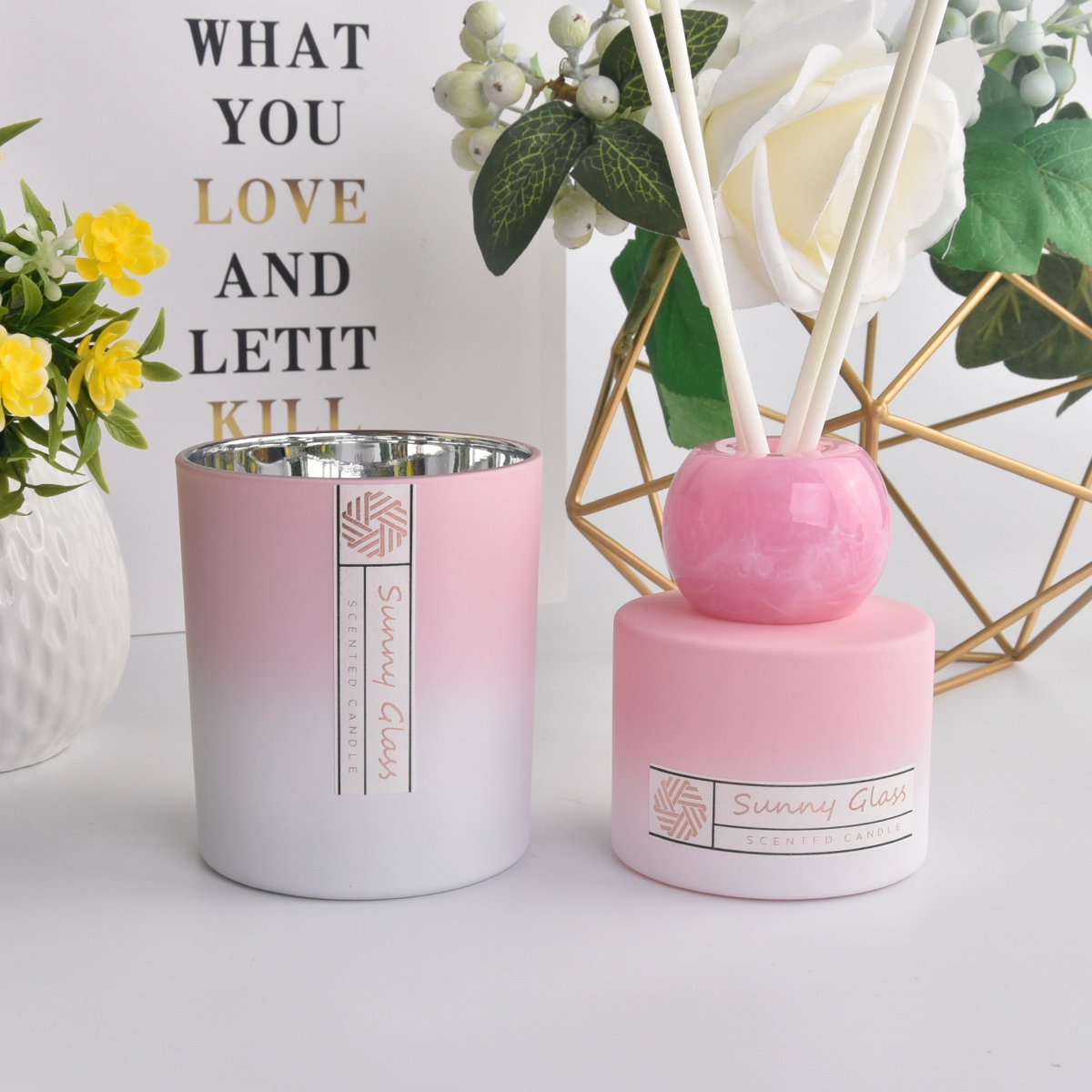 Elegant gradual change pink glass reed diffuser bottle and glass candle holder Elegant gradual change pink glass reed diffuser bottle and glass candle holder
