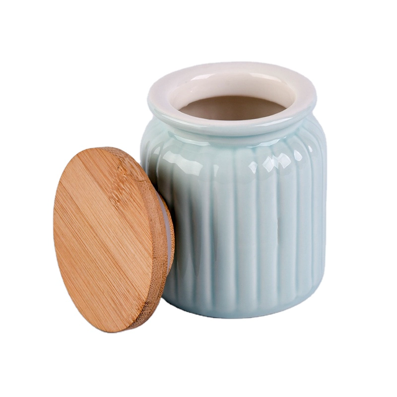 Light blue round ceramic candle jar with wood lid for home decoration