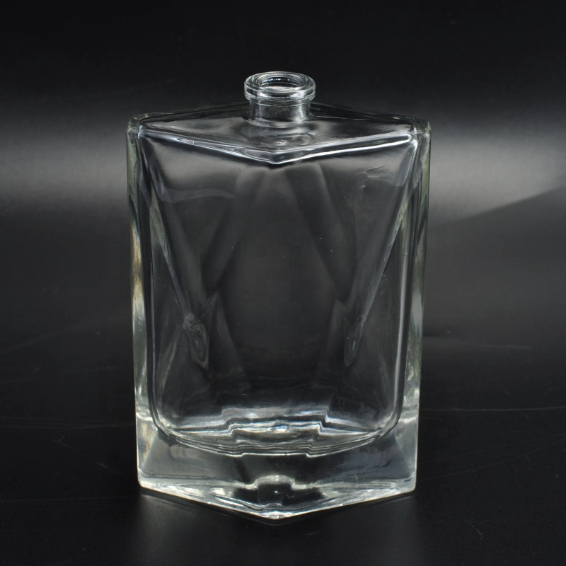 Empty embossed perfume fragrance oil bottle