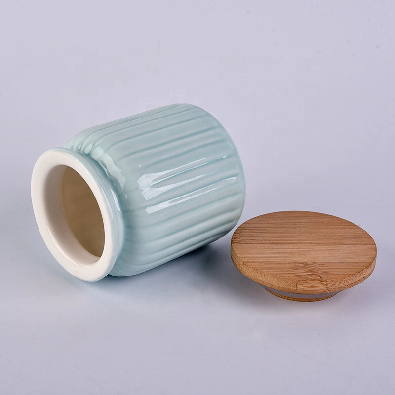 Light blue round ceramic candle jar with wood lid for home decoration