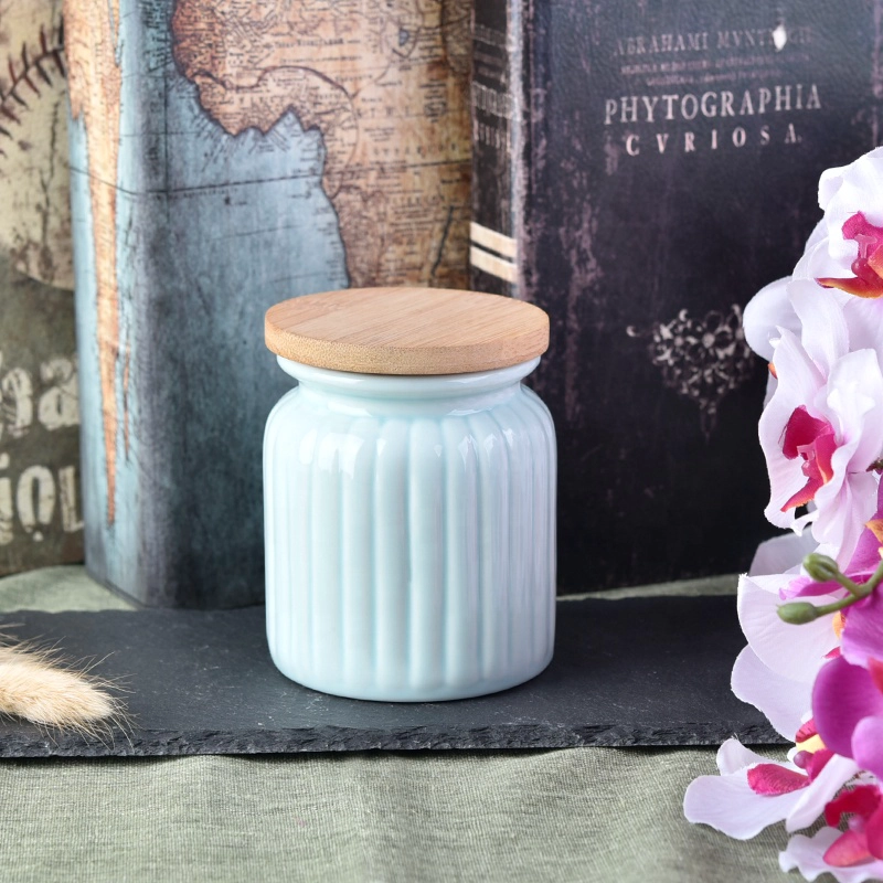 Light blue round ceramic candle jar with wood lid for home decoration