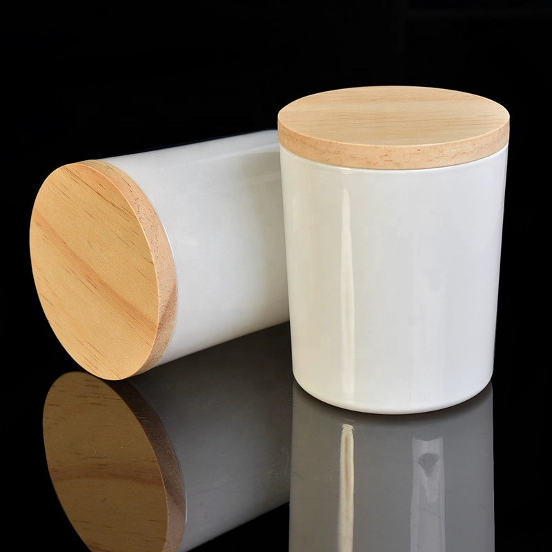 Stock white painting glass candle holder with wooden lid