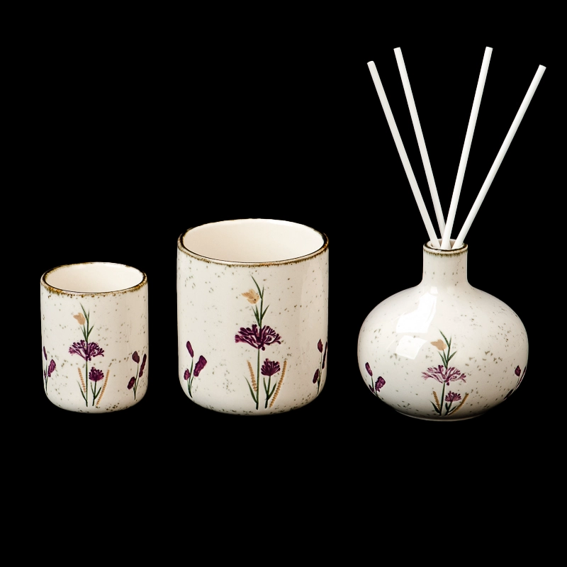 Ivory white glazed ceramic candle jars with spots and printing decorated for scented candle filling