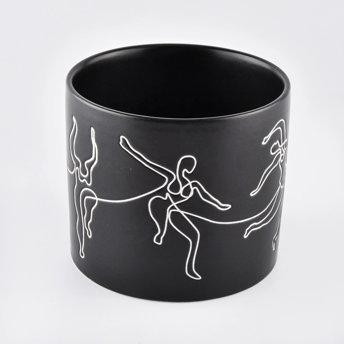 black ceramic candle jars with white printing