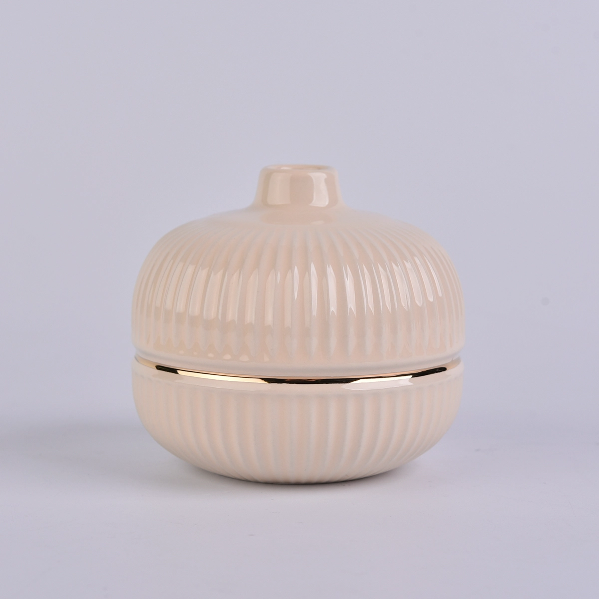 round ceramic bottle in nude color with gold ring, ceramic diffuser bottles