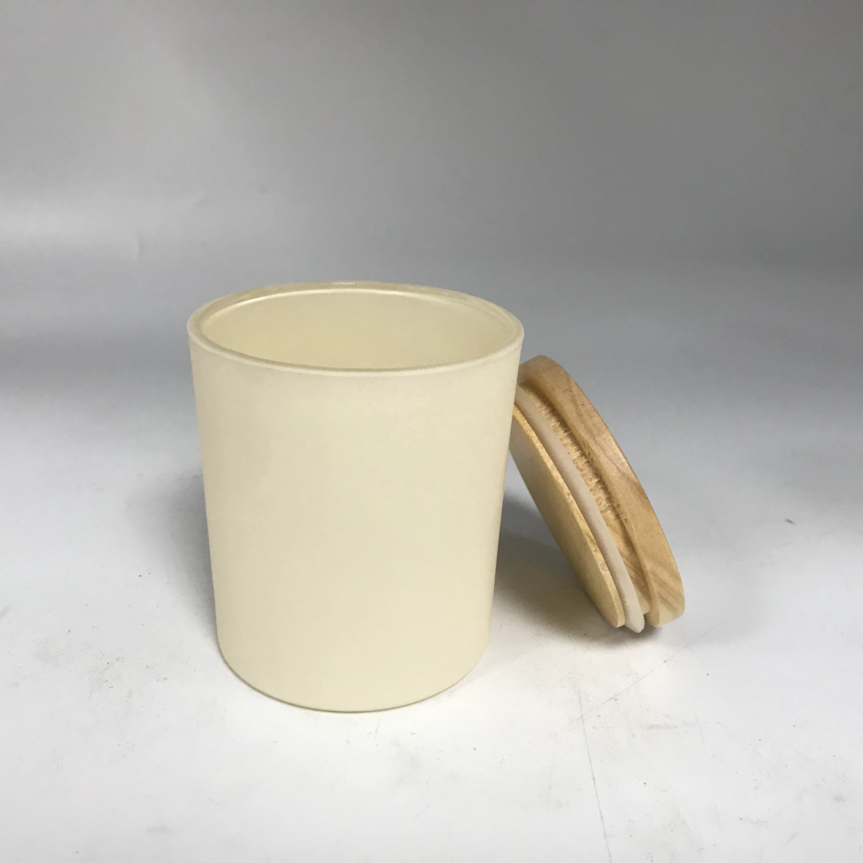 off-white glass candle jars with wood lid
