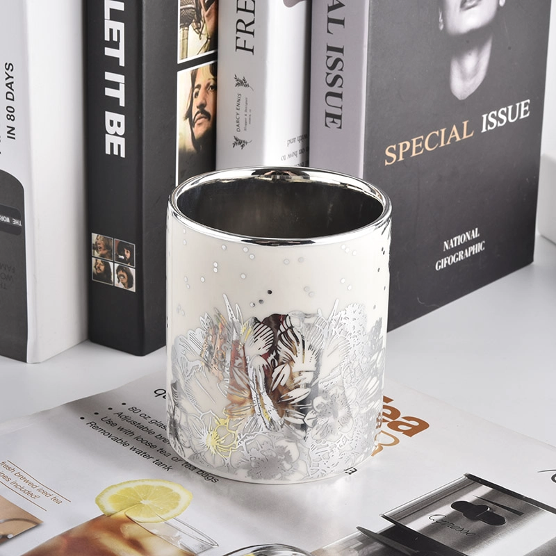 white ceramic candle jars with silver flowers printing
