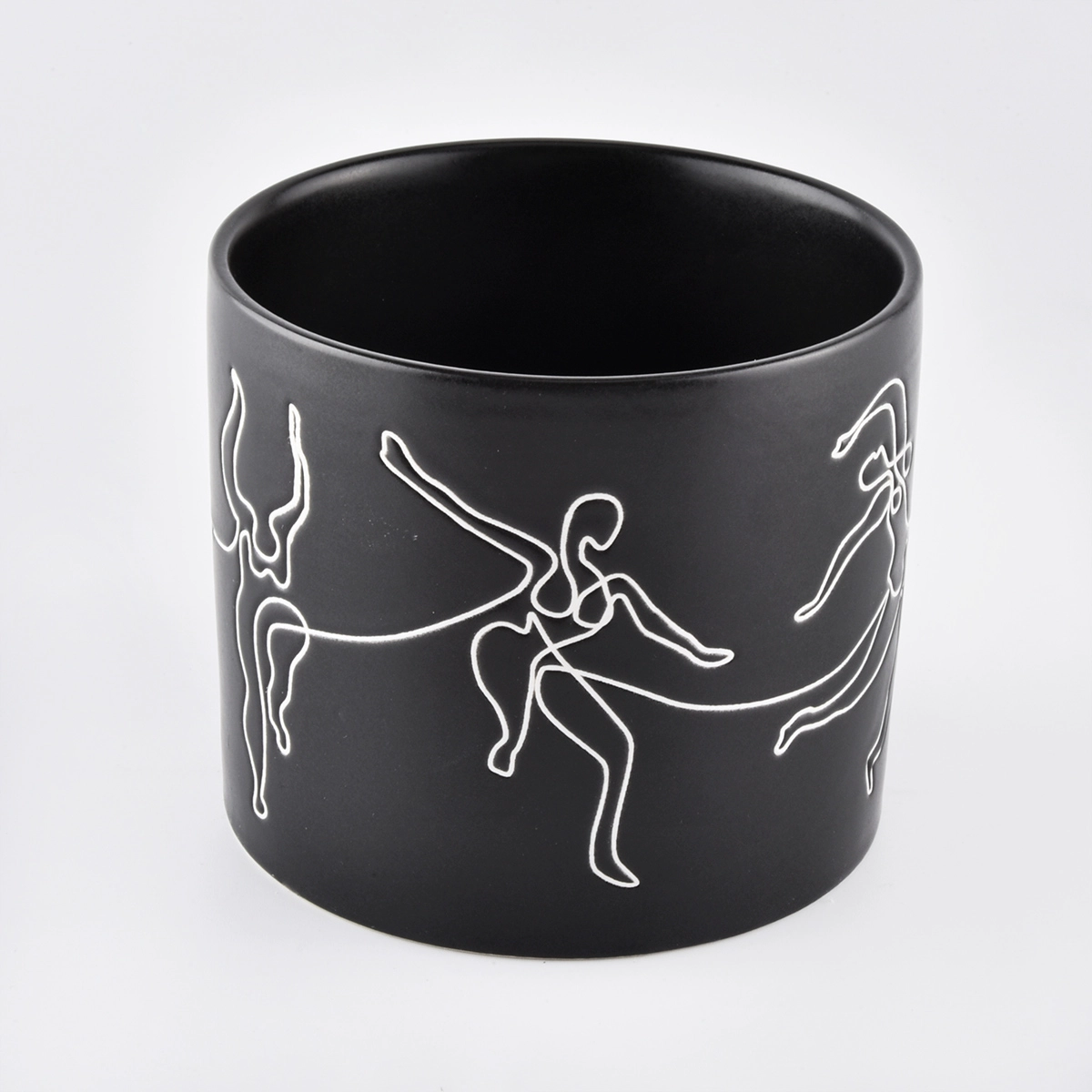 black ceramic candle jars with white printing