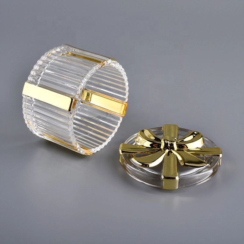 gold colored glass empty container with glass lid, gift box shaped glass jar