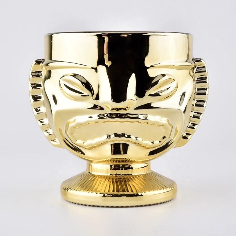 trophy shaped gold glass candle jars