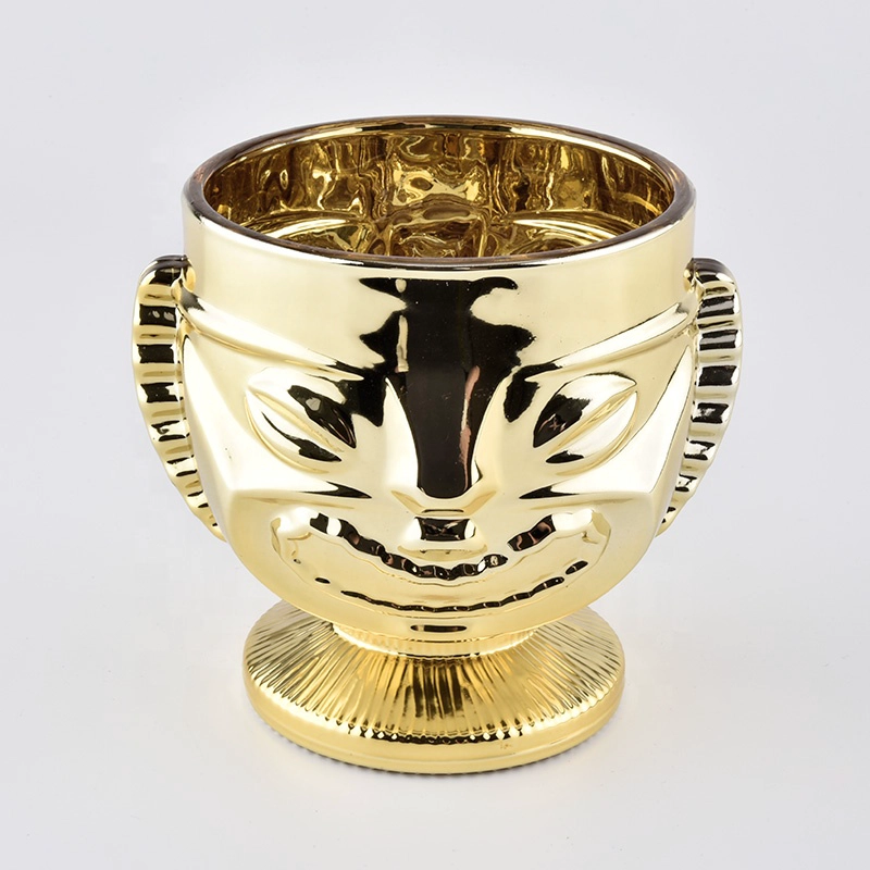 trophy shaped gold glass candle jars