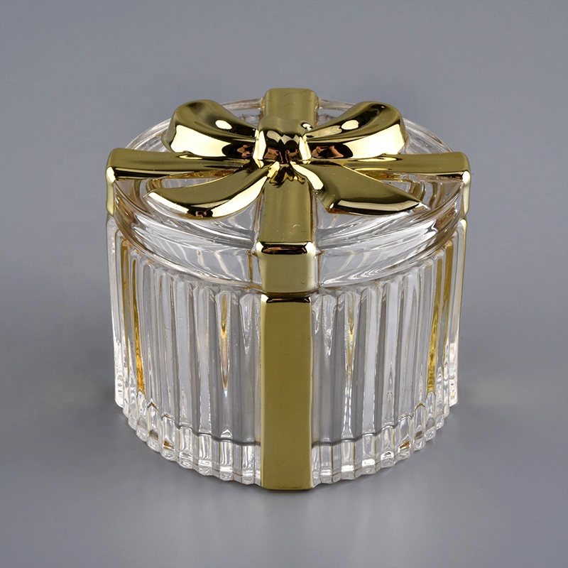 gold colored glass empty container with glass lid, gift box shaped glass jar