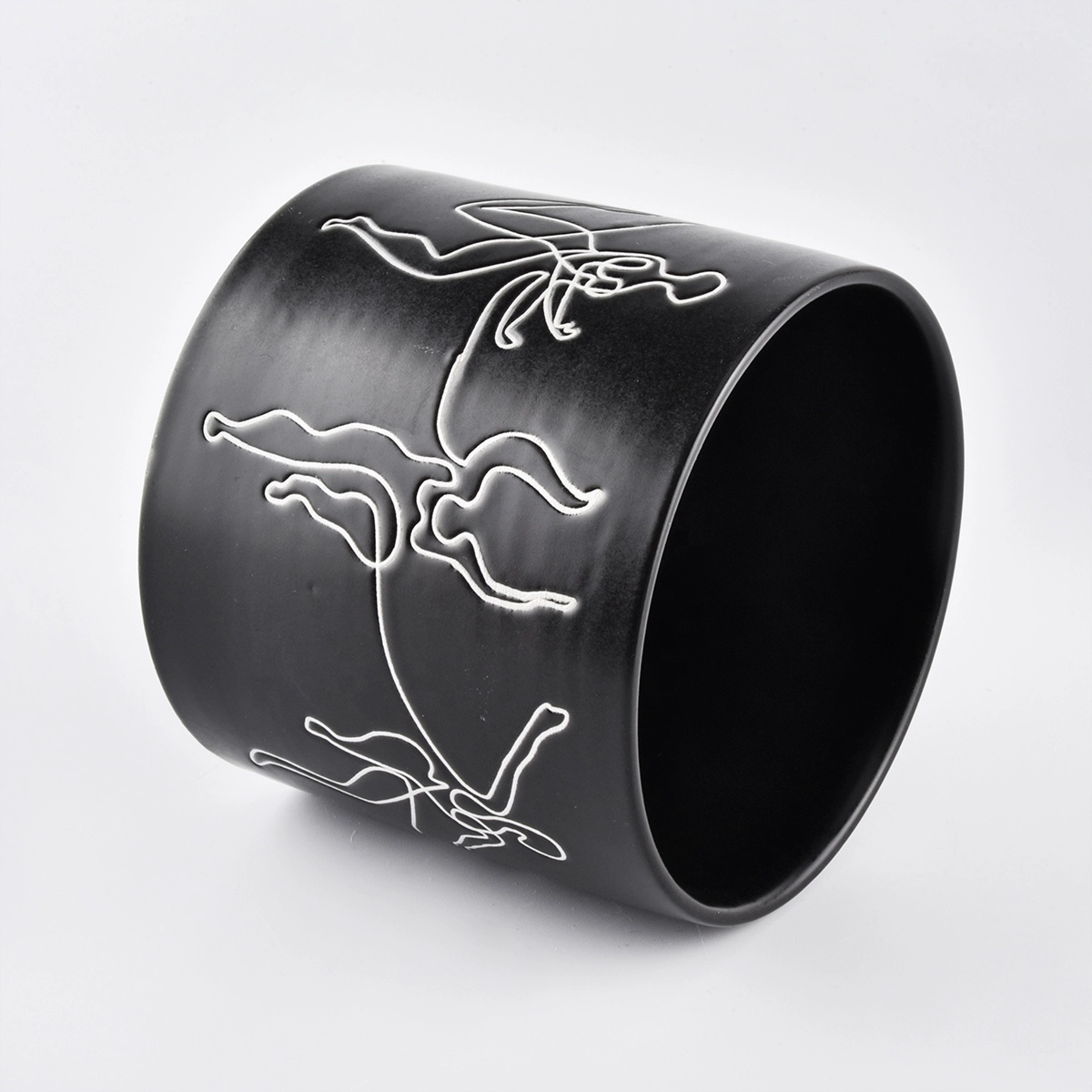 black ceramic candle jars with white printing