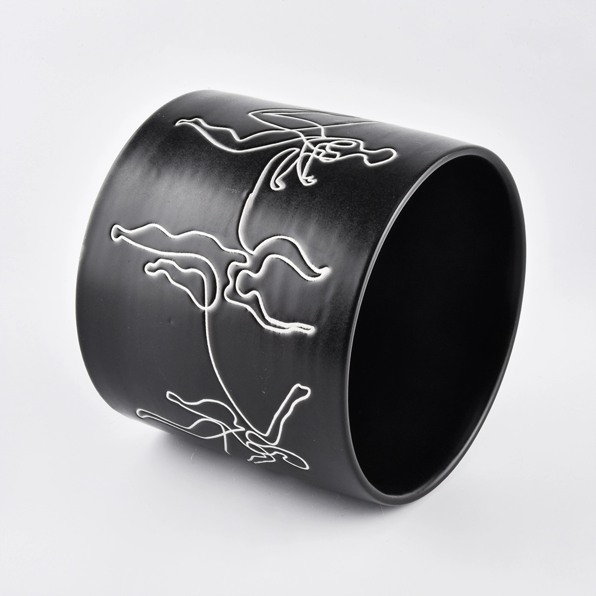 black ceramic candle jars with white printing