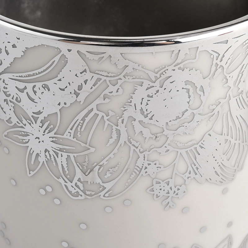 white ceramic candle jars with silver flowers printing