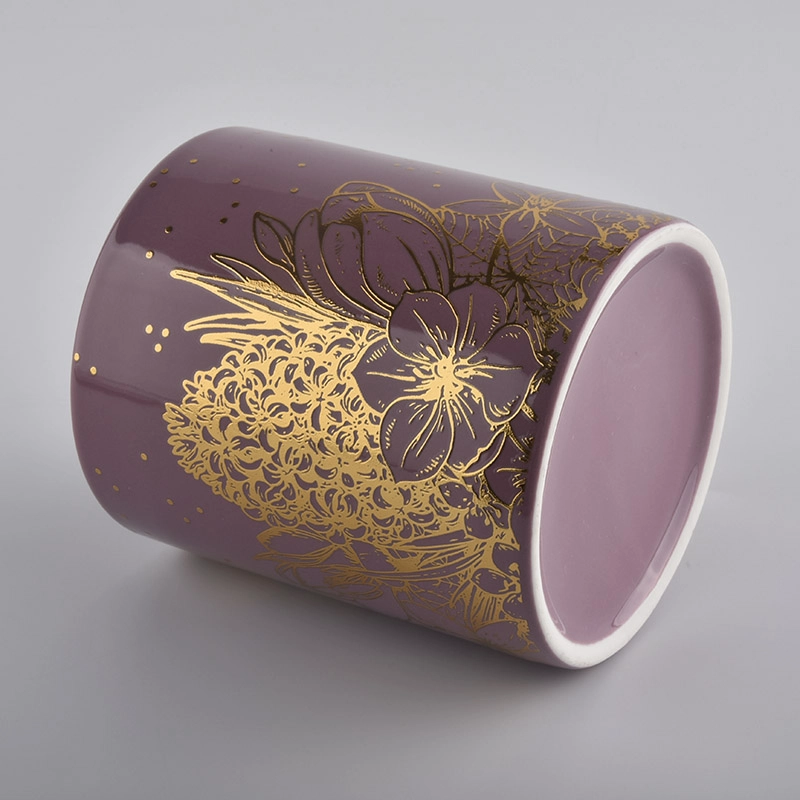 pink glazed ceramic candle jars with gold printing