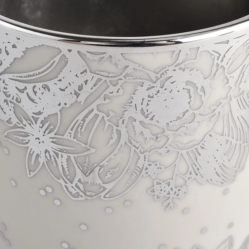 white ceramic candle jars with silver flowers printing