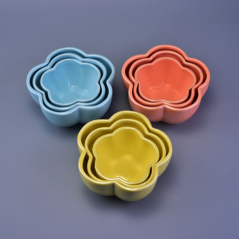 Flower design ceramic candle holders in various sizes