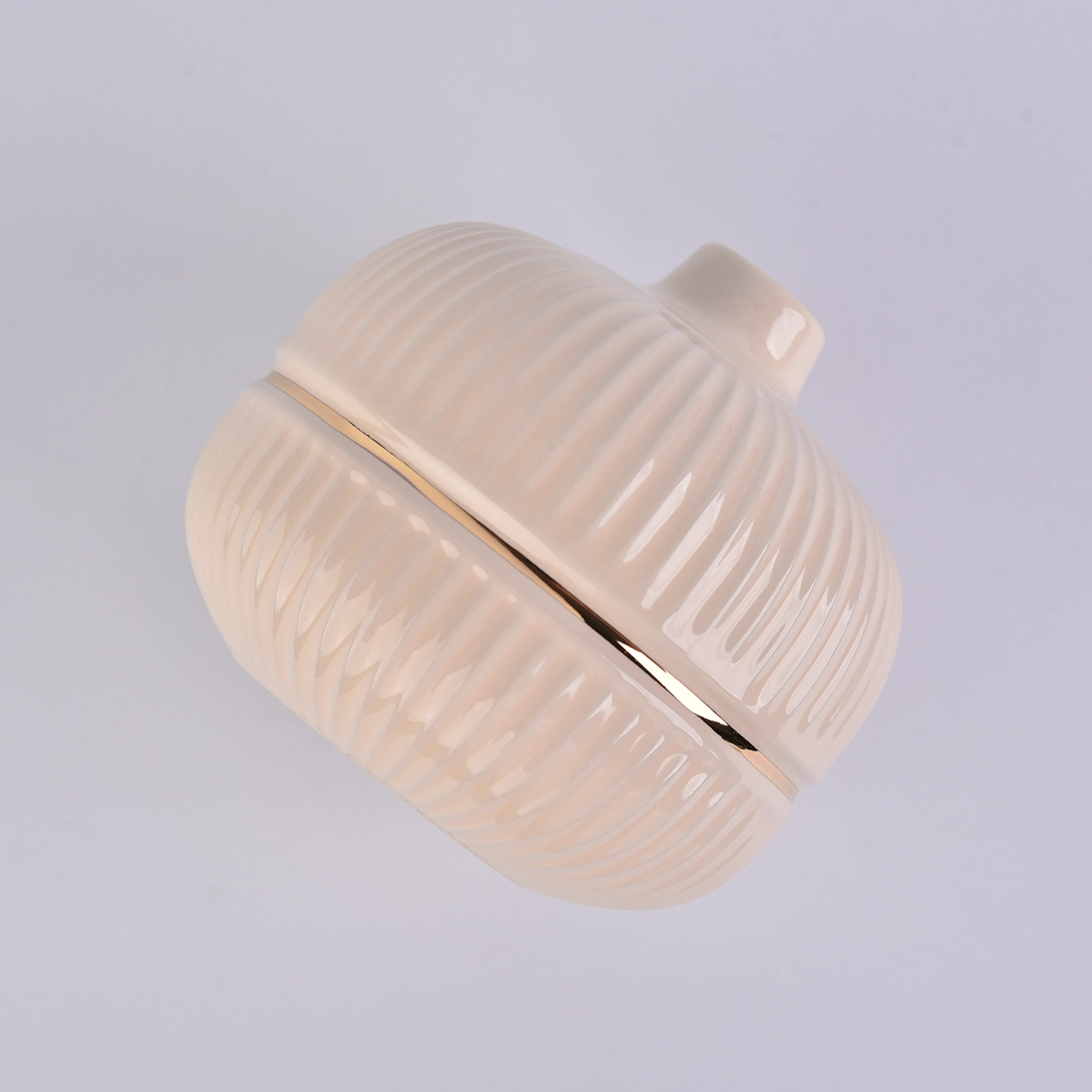round ceramic bottle in nude color with gold ring, ceramic diffuser bottles
