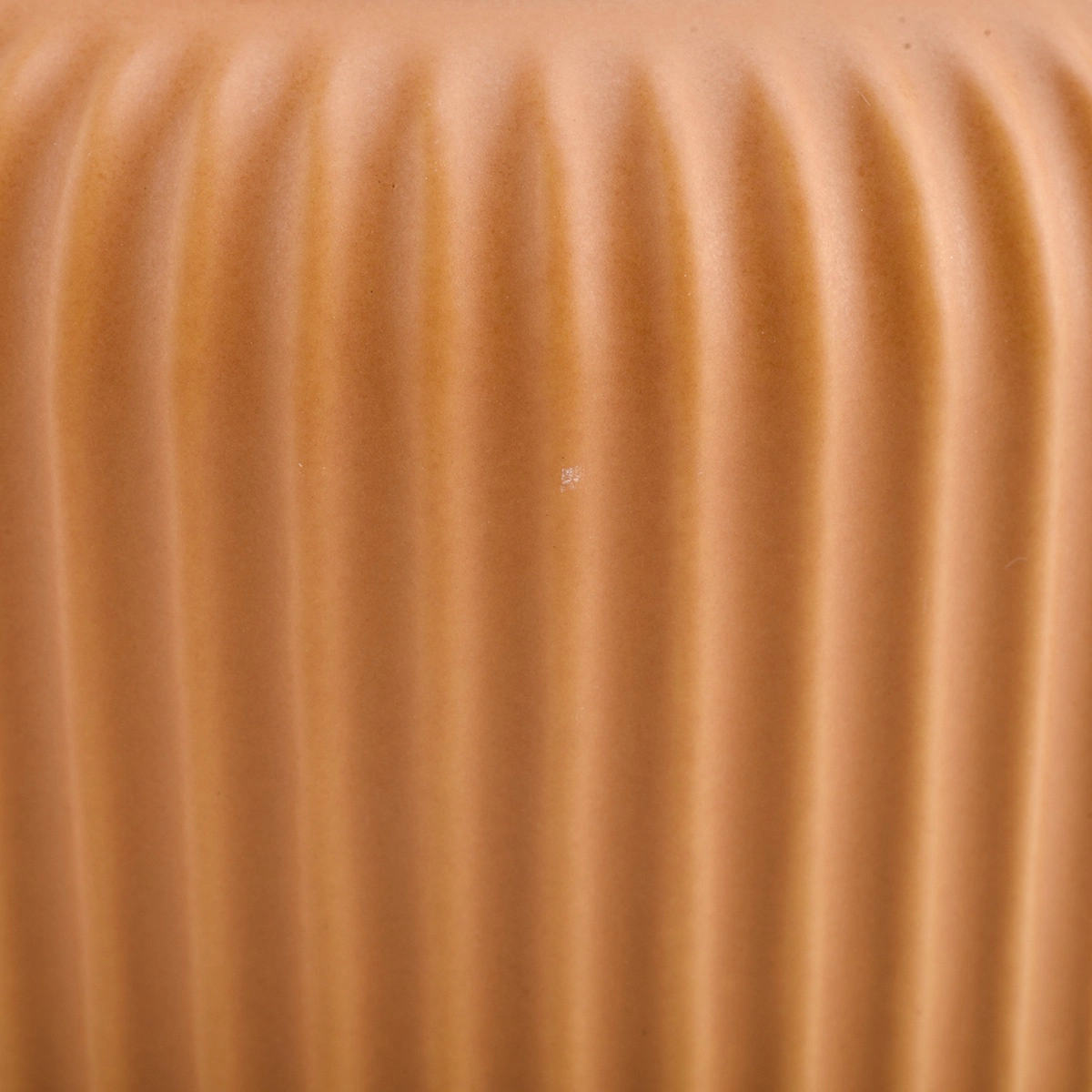 peach glazed ceramic candle vessels with stripe designs