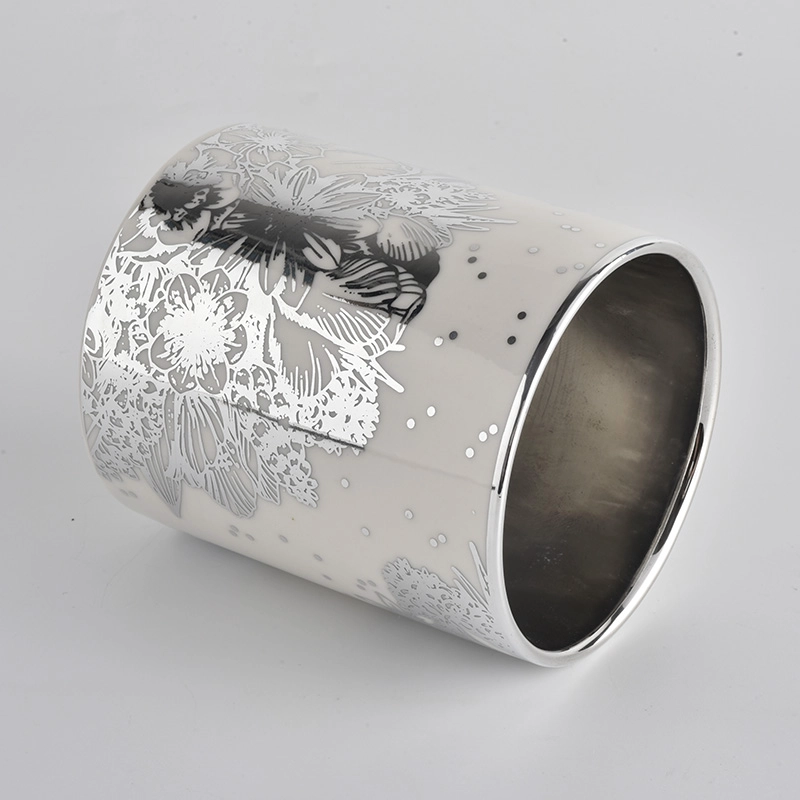 white ceramic candle jars with silver flowers printing