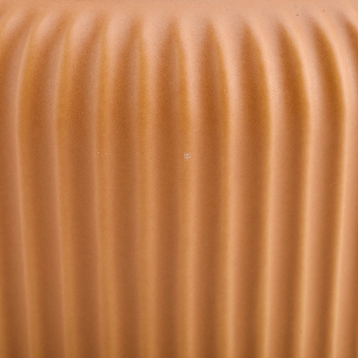peach glazed ceramic candle vessels with stripe designs
