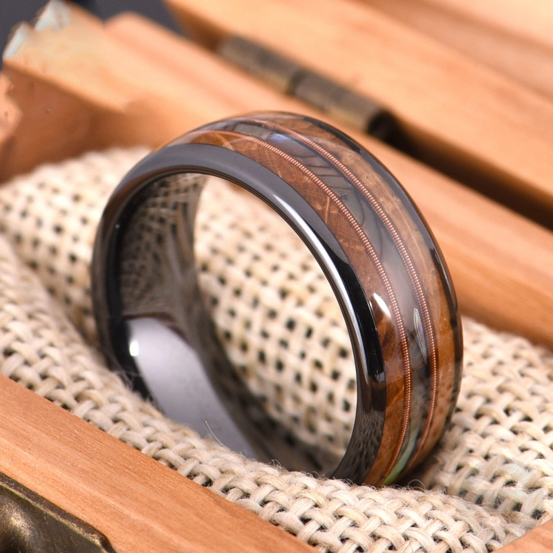 Erstaunliche 8mm hoch polierte gewölbte schwarze Wolframkarbid-Hochzeitsbänder mit Abalone-Muschel- und Holz-Inlay-Center-Roségold-Gitarren-Zeichenfolge China-Hersteller