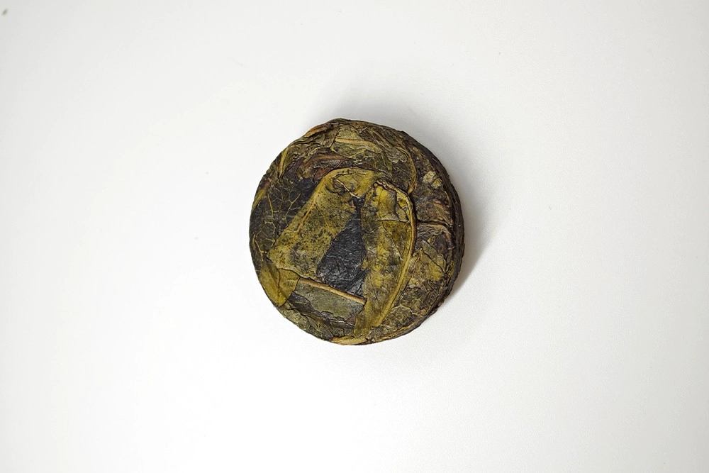 Tea cake pressing