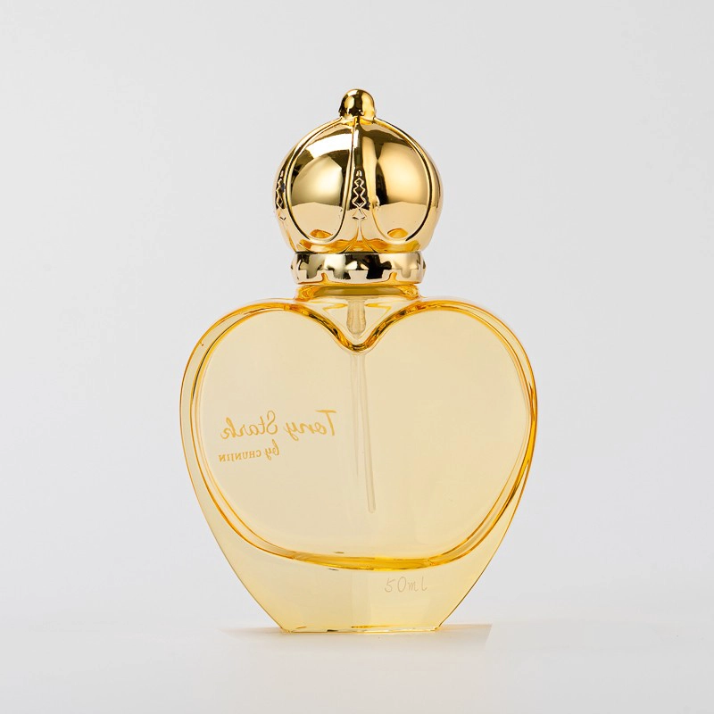 Wholesale 50ml Love shape glass perfume bottle with gold cap