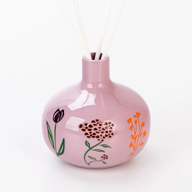 Wholesaling Fancy Pattern Pink Glazed Aroma Ceramic Bottle for Fragrance