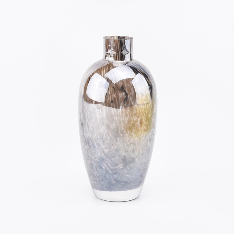 China Luxury colored glass perfume bottle manufacturer