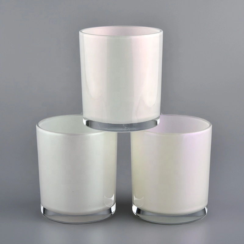 white iridescent candle holder with spraying color inside