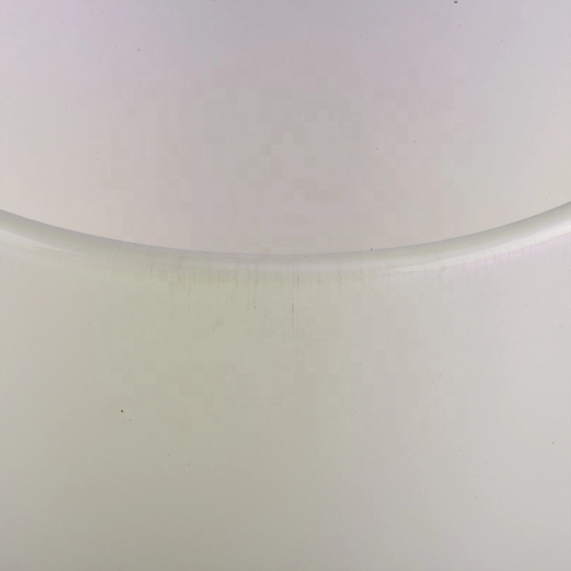 white iridescent candle holder with spraying color inside