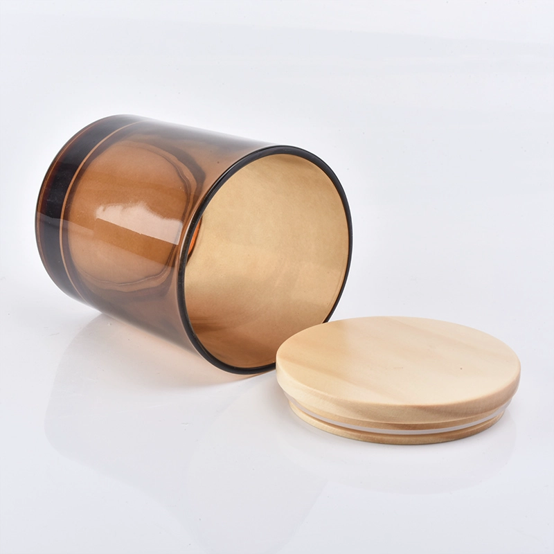 translucent amber glass candle vessel with wooden lid