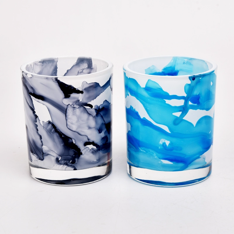 white and black mixed color glass candle jars with marble effect