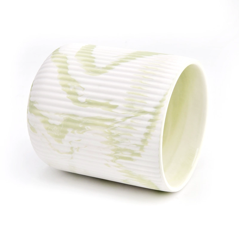 green and white decorative candle jar fluted ceramic vessel