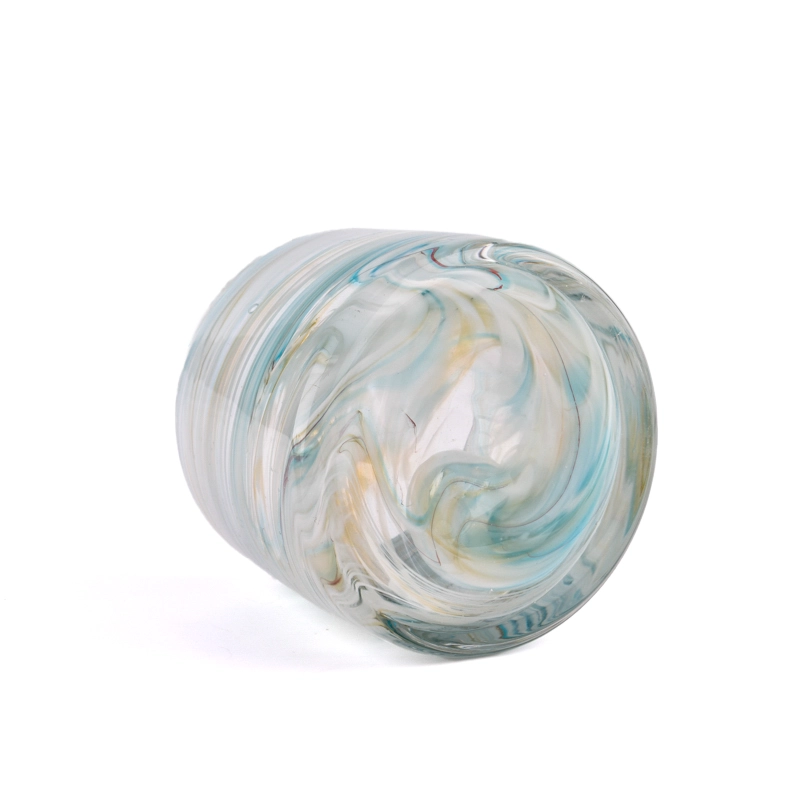 iridescent glass candle jars with coloring material 