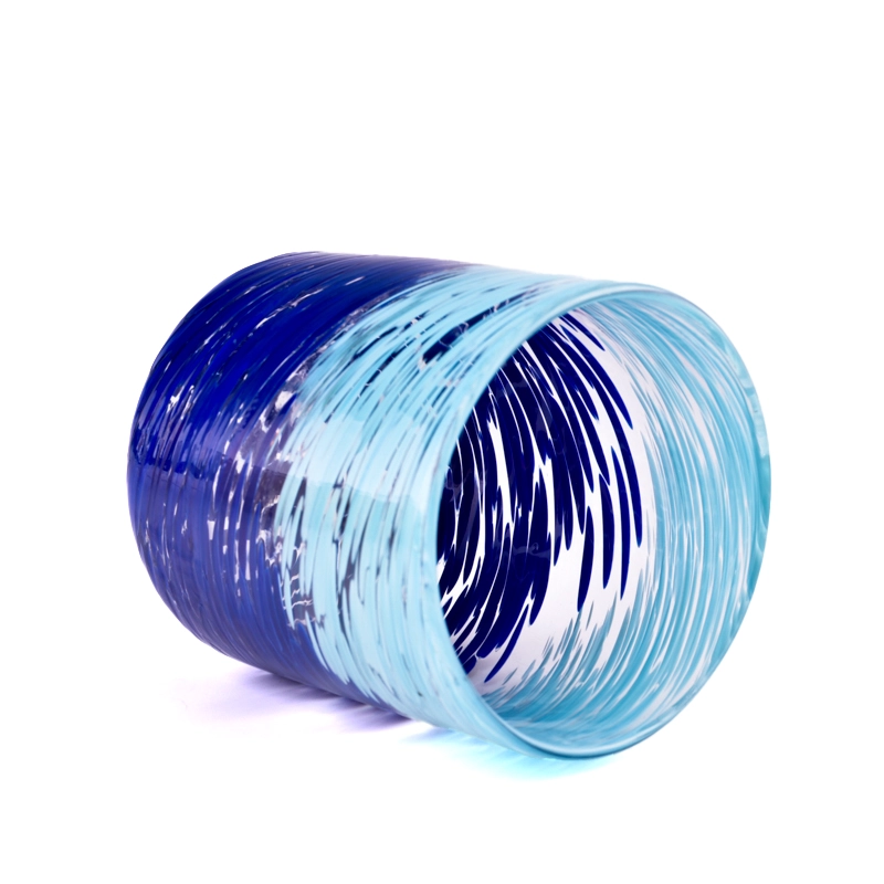blue glass candle vessel hand colorful candle jars